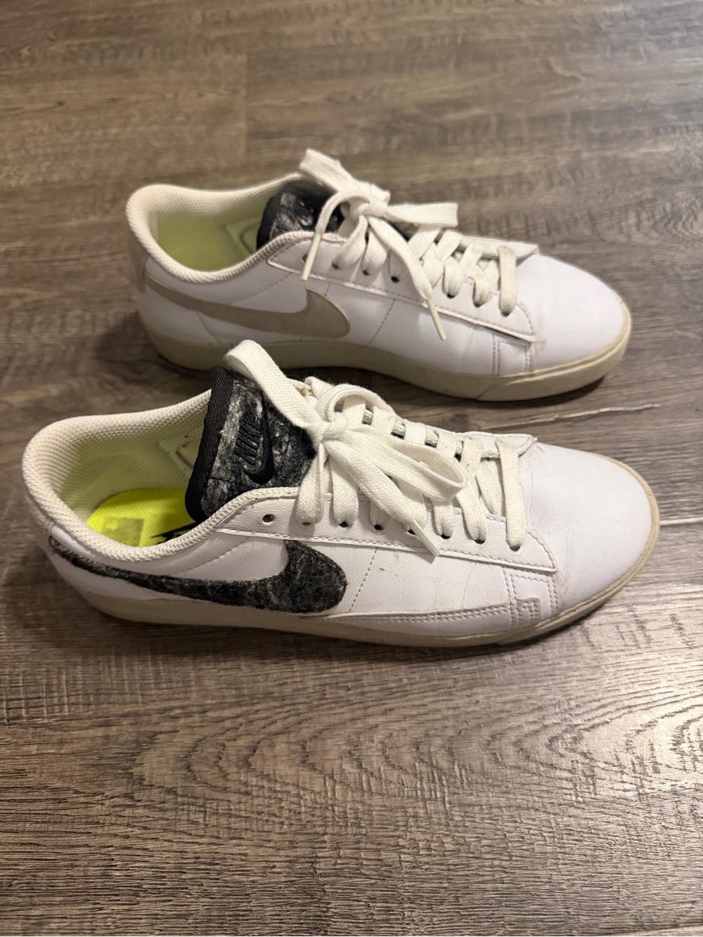 Nike Kids White Sneakers with Black Swoosh and Neon Yellow Lining